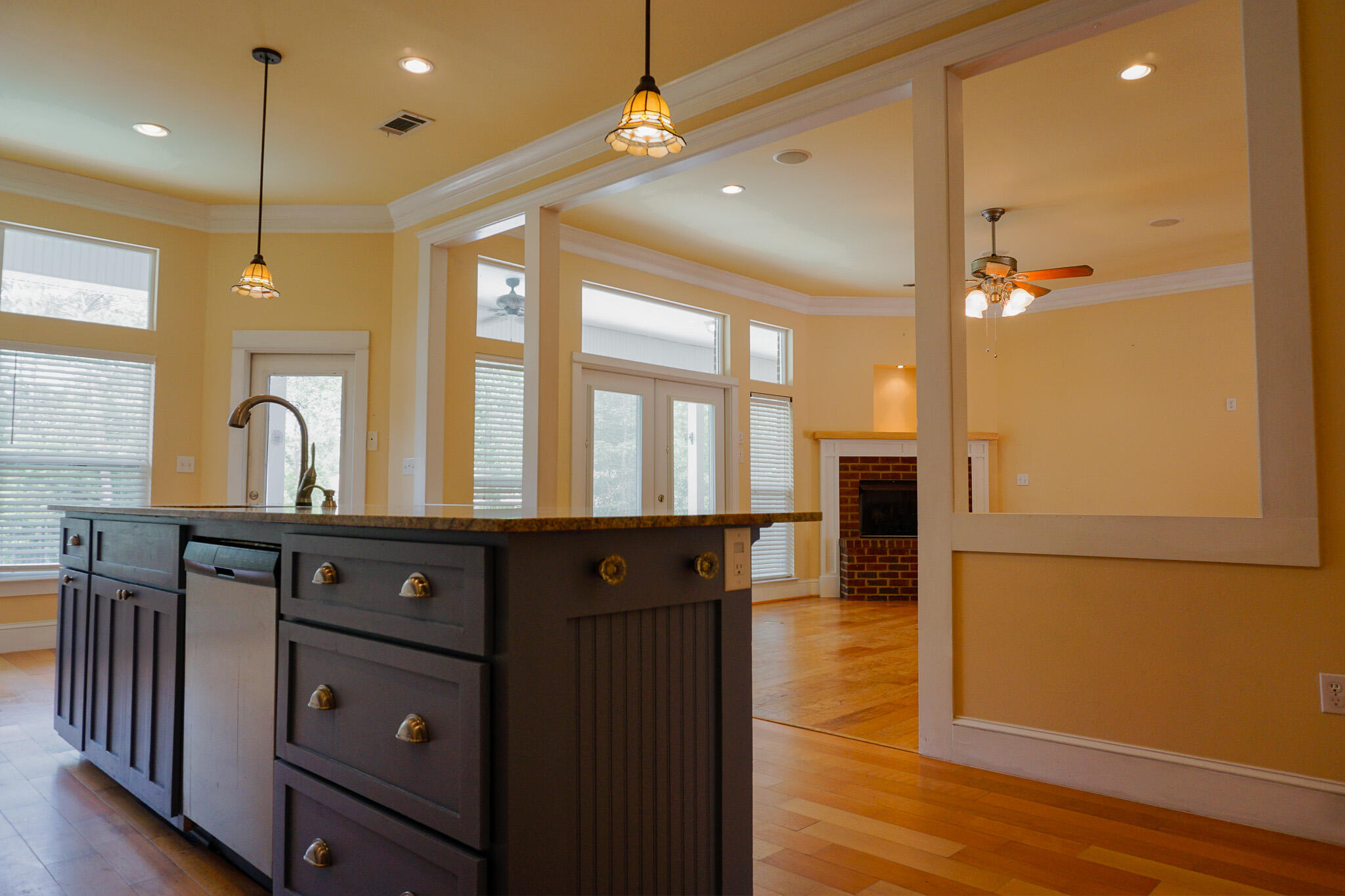 114 Eagle Drive Crestview, FL 32536 - Photo 16 of 63 a kitchen with a refrigerator a stove and wooden floor
