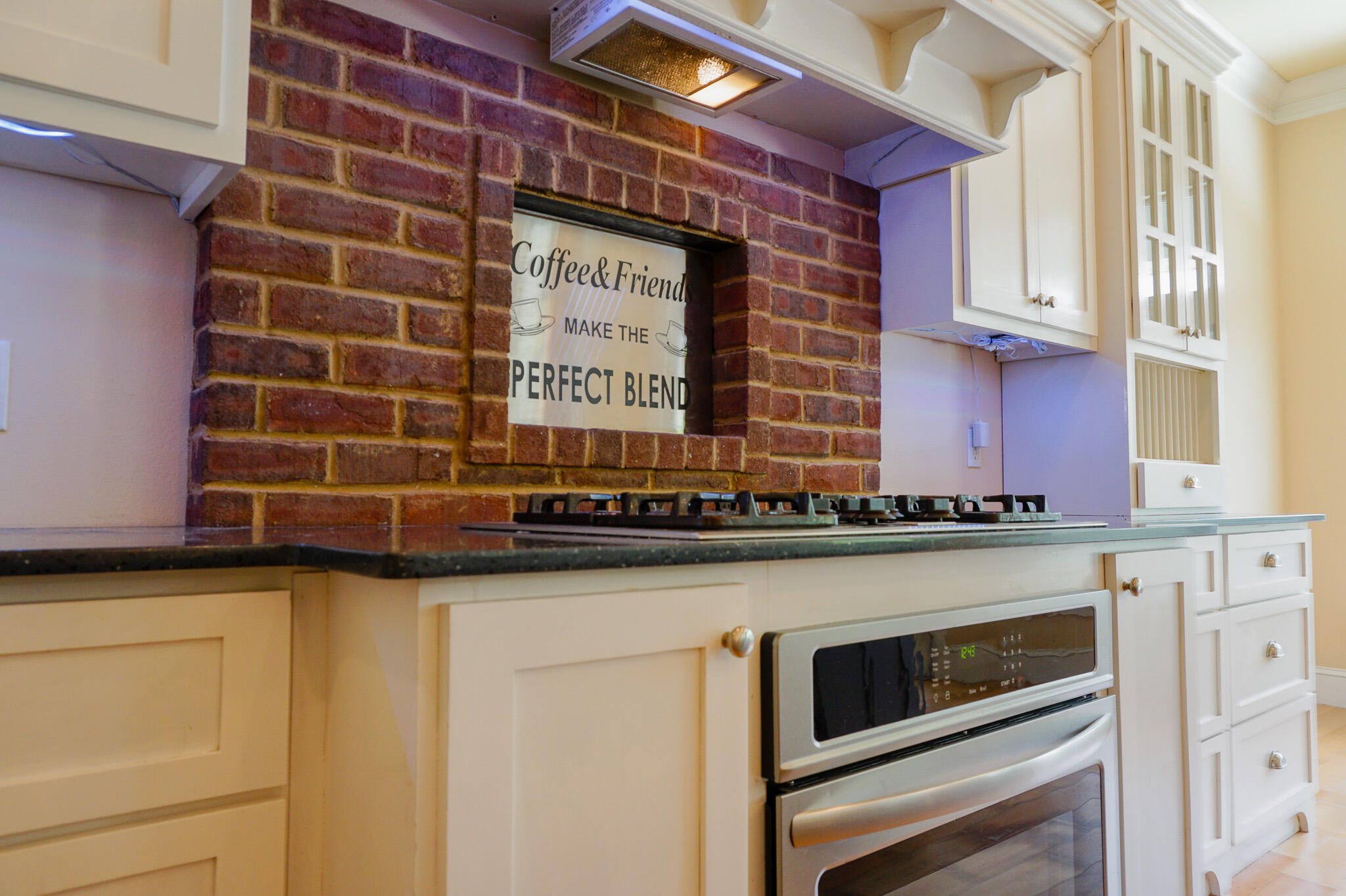 114 Eagle Drive Crestview, FL 32536 - Photo 17 of 63 a kitchen with a stove and a microwave