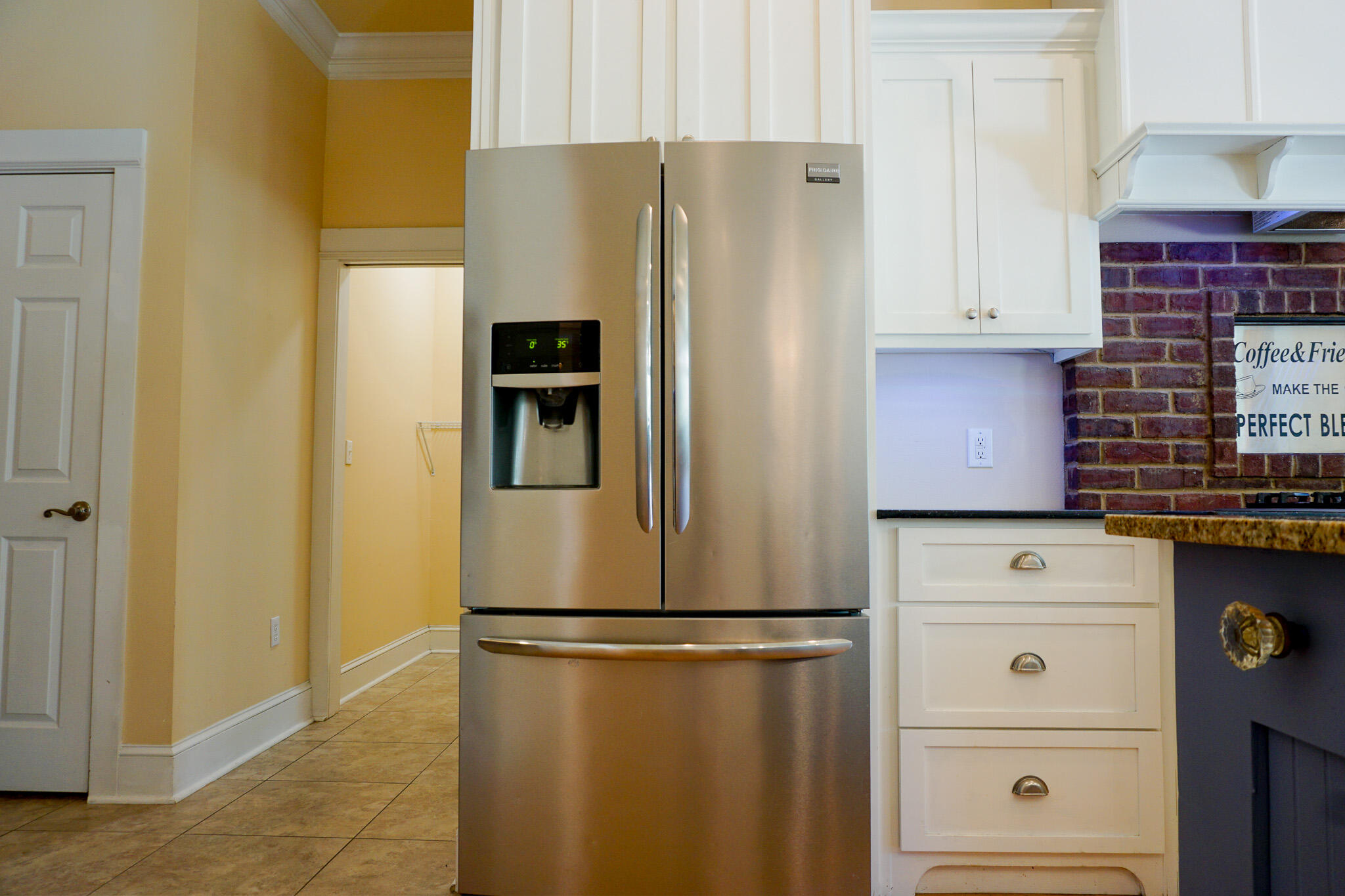 114 Eagle Drive Crestview, FL 32536 - Photo 19 of 63 a white refrigerator freezer sitting in a kitchen