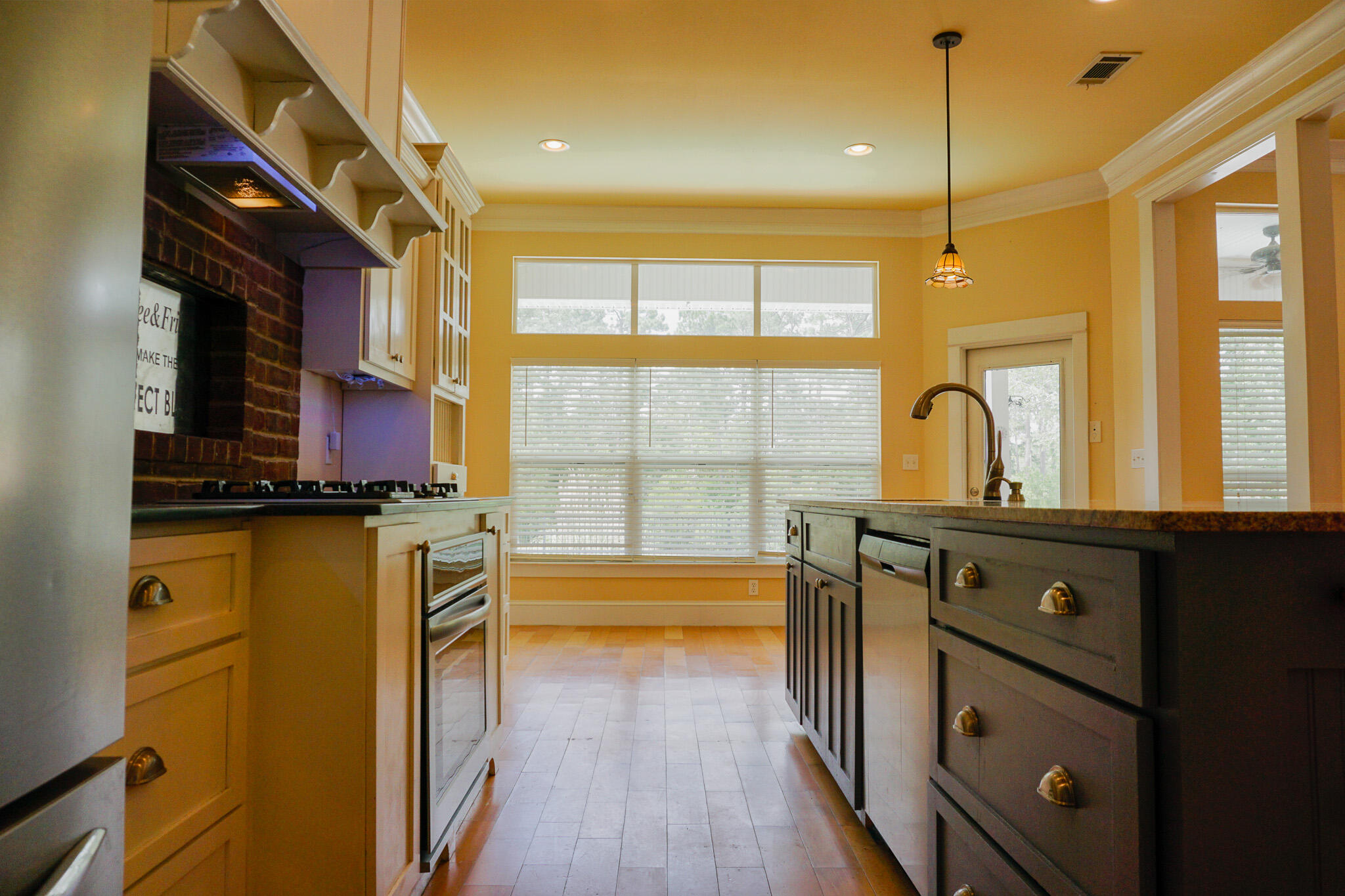 114 Eagle Drive Crestview, FL 32536 - Photo 22 of 63 a view of a kitchen with a large window