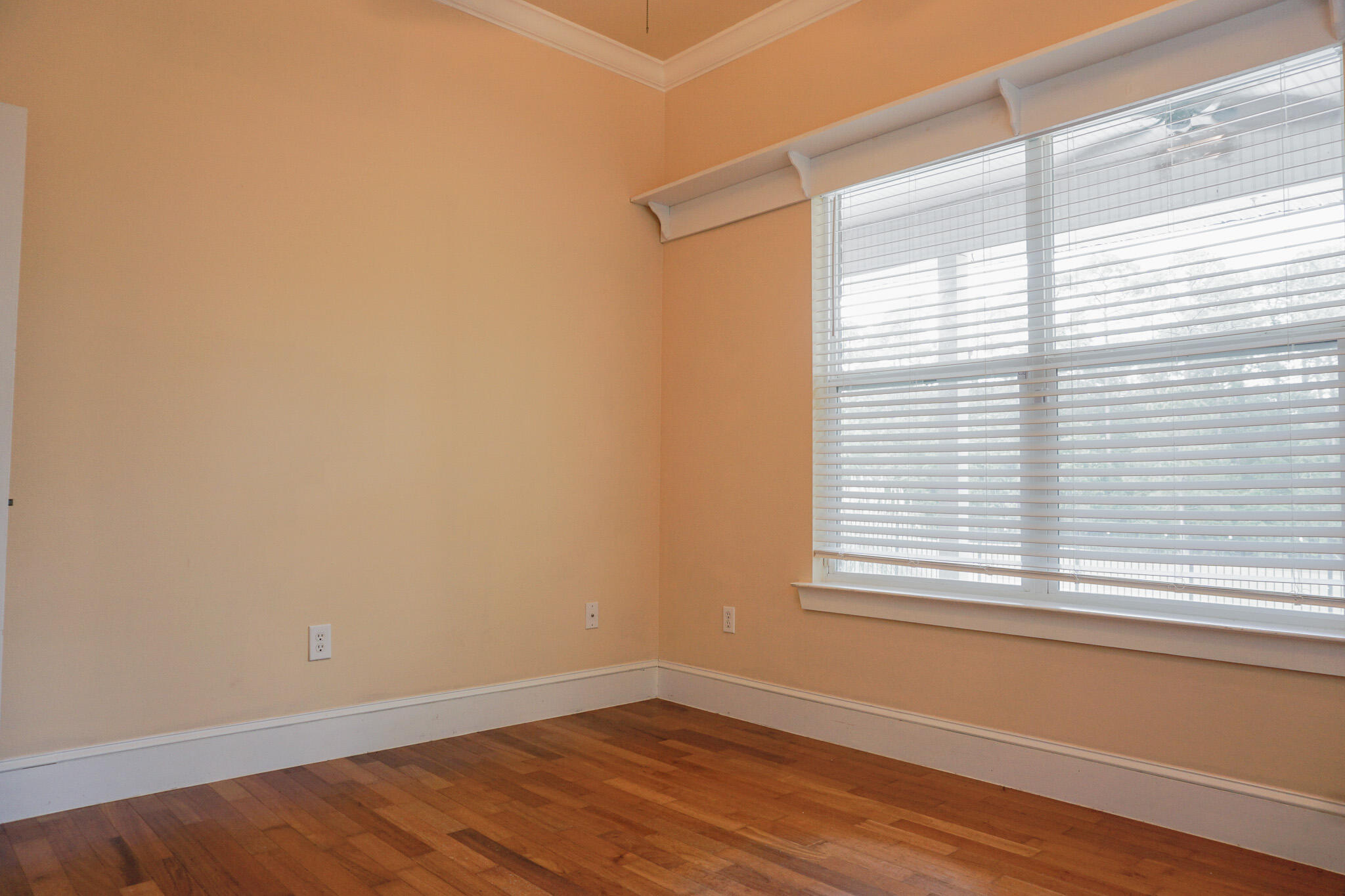 114 Eagle Drive Crestview, FL 32536 - Photo 45 of 63 a view of a room with wooden floor and a window