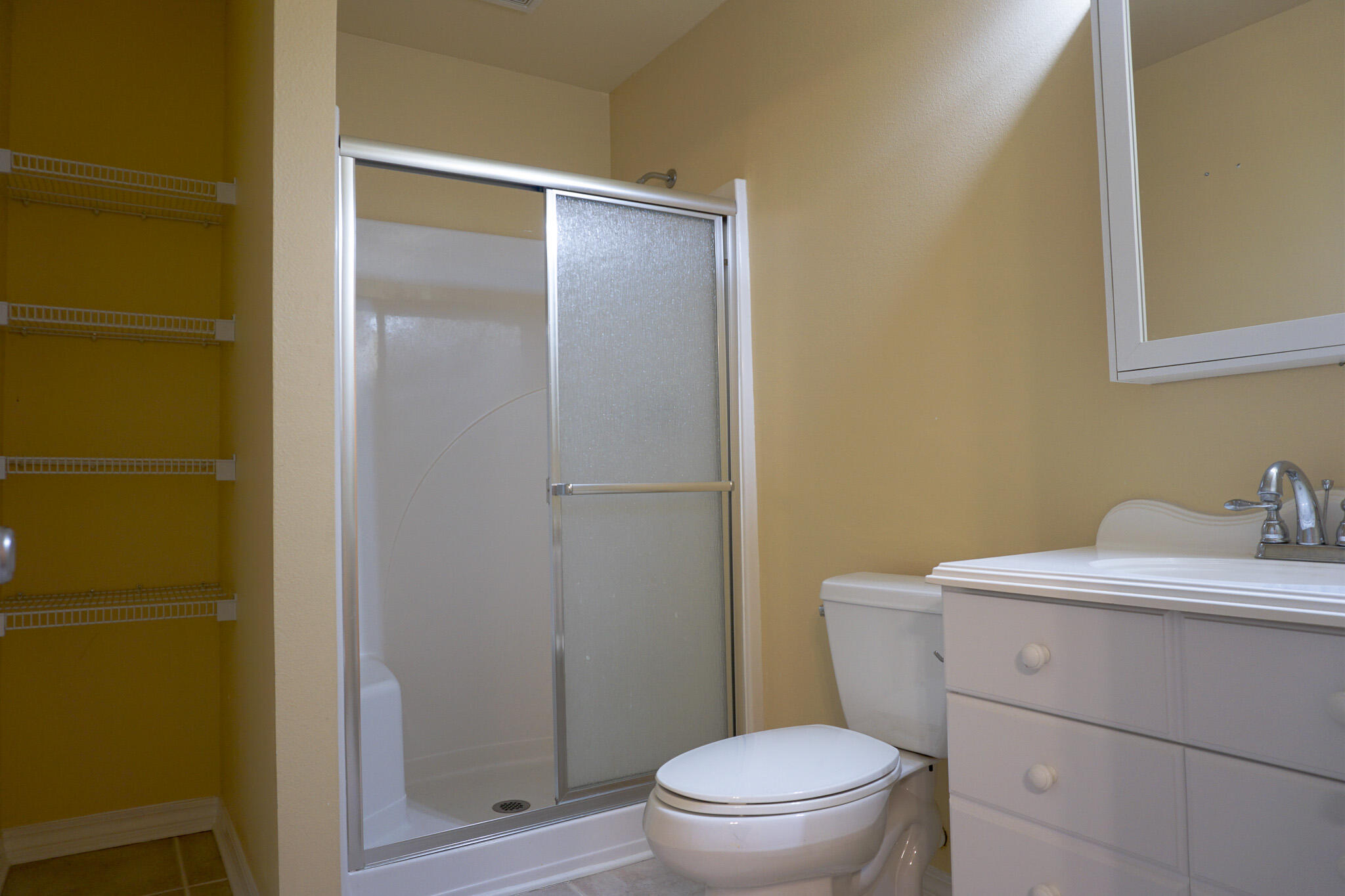 114 Eagle Drive Crestview, FL 32536 - Photo 47 of 63 a bathroom with a granite countertop sink toilet and shower
