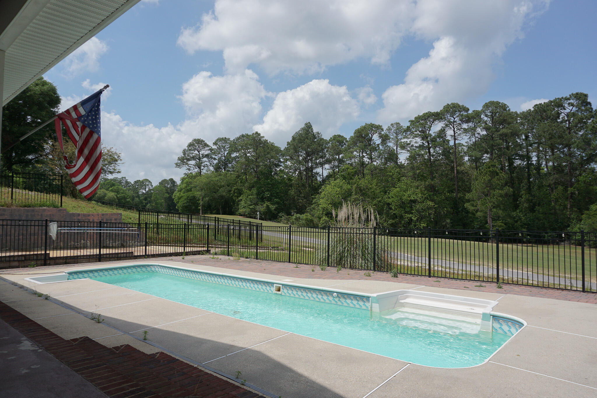 114 Eagle Drive Crestview, FL 32536 - Photo 58 of 63 a view of swimming pool with a yard
