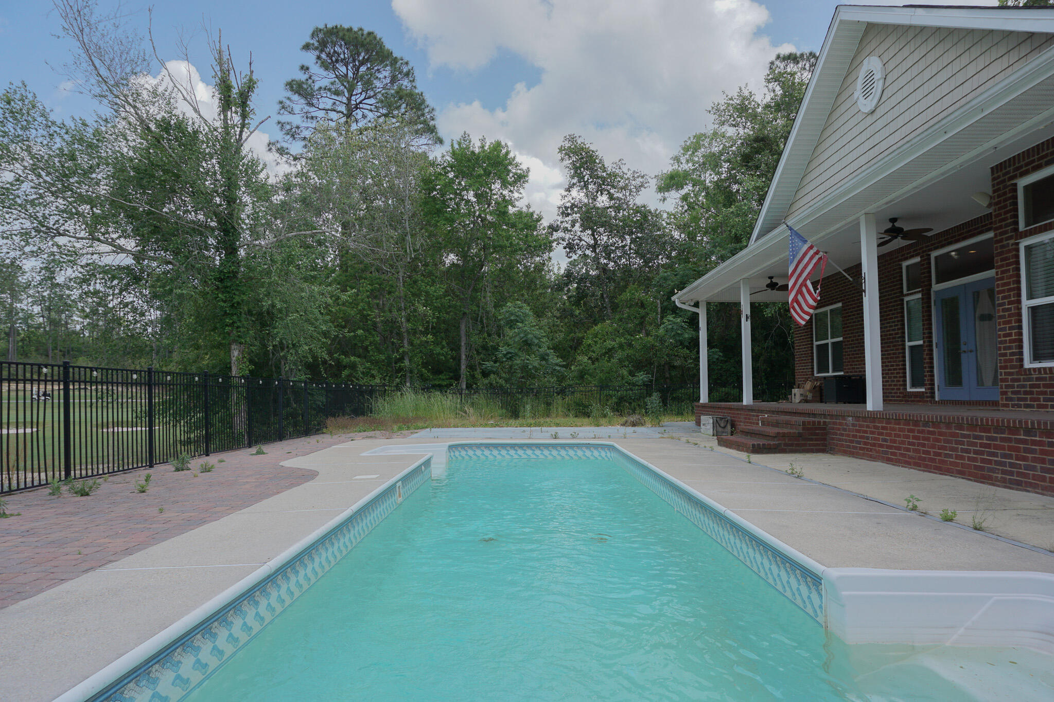 114 Eagle Drive Crestview, FL 32536 - Photo 62 of 63 a view of backyard with a garden and plants