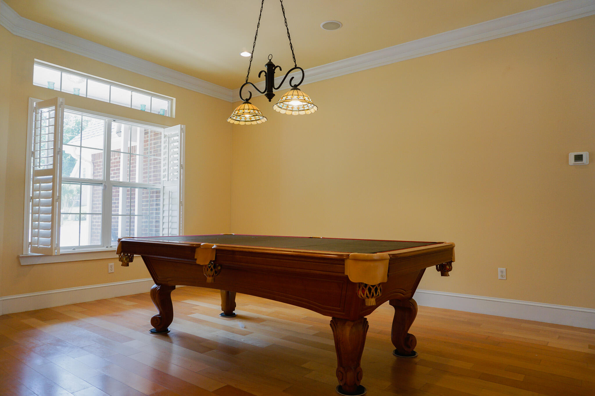 114 Eagle Drive Crestview, FL 32536 - Photo 10 of 63 a view of a workspace with furniture and a window