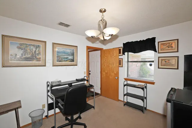 a view of a livingroom with furniture