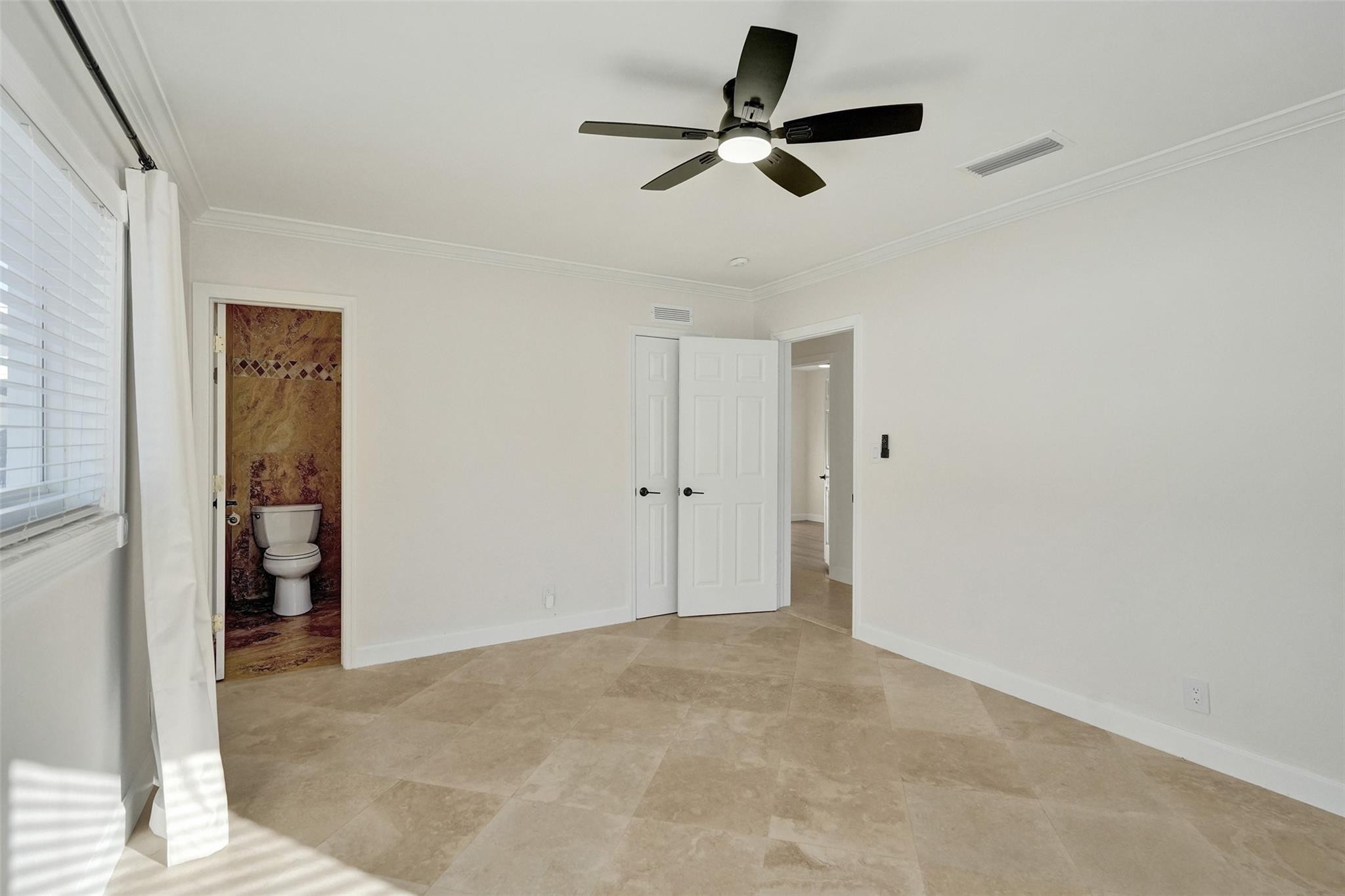 2011 Northeast 34th Street Lighthouse Point, FL 33064 - Photo 28 of 47 wooden floor in an empty room