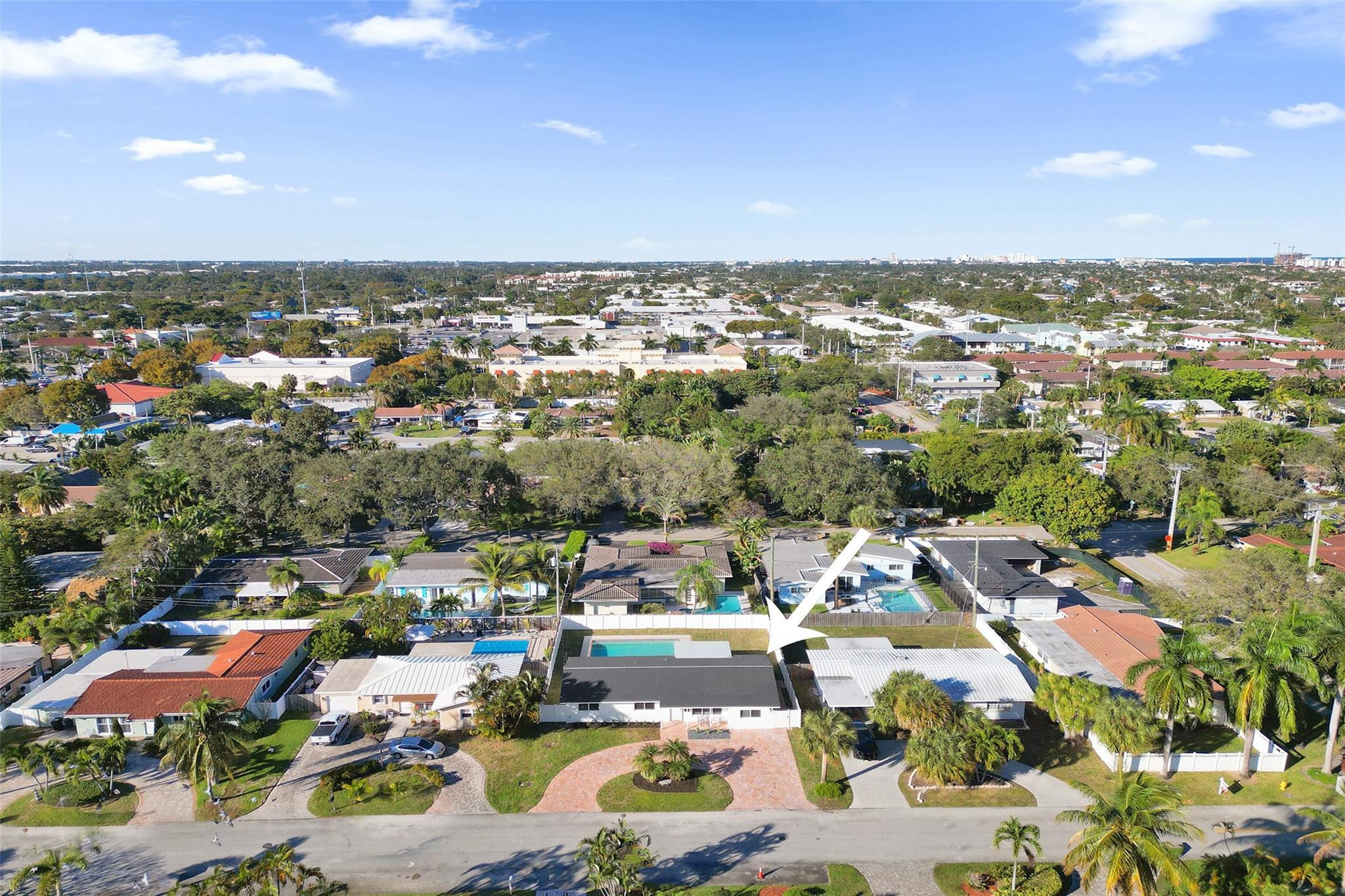 2011 Northeast 34th Street Lighthouse Point, FL 33064 - Photo 5 of 47 an aerial view of a city