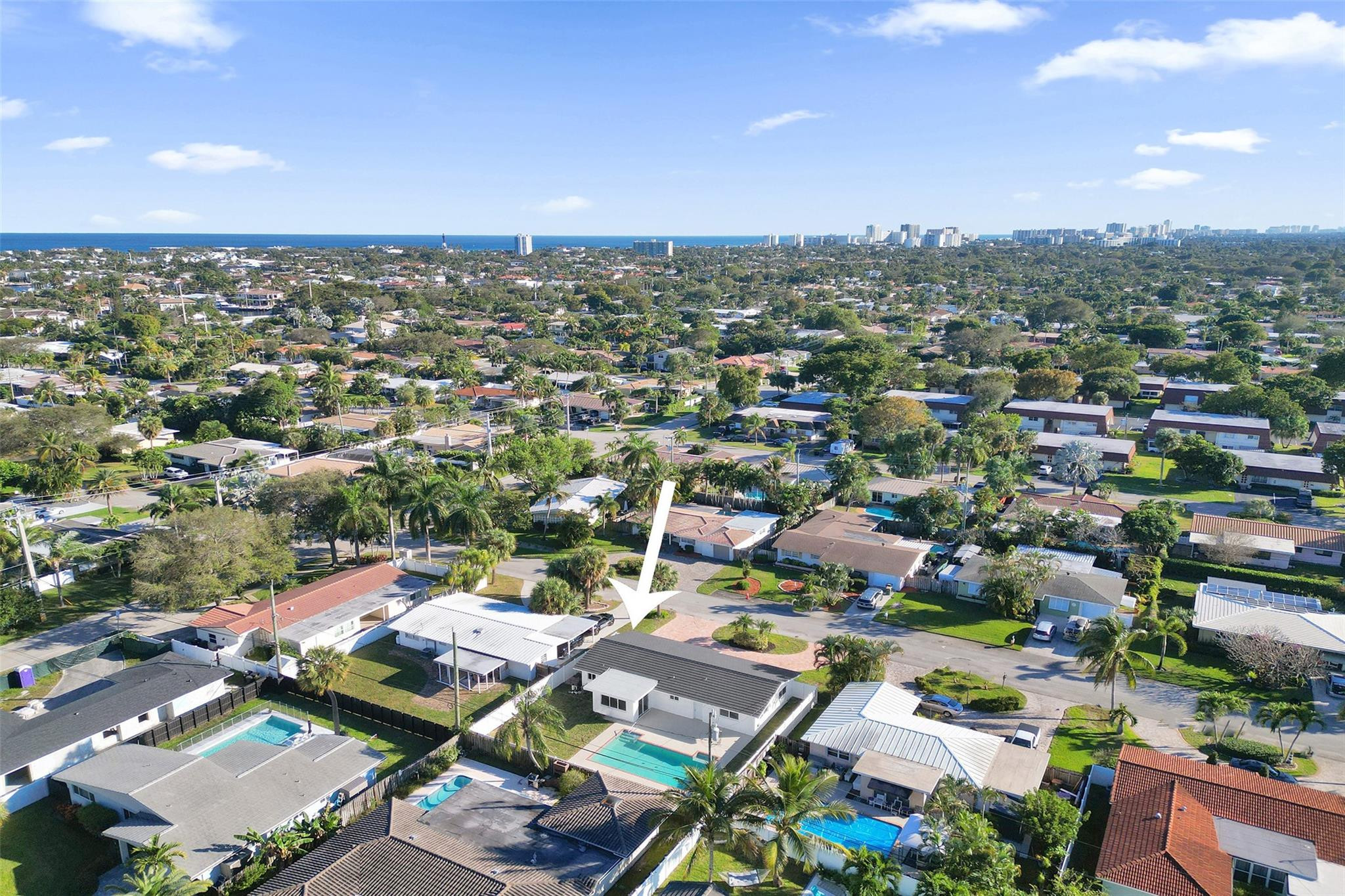 2011 Northeast 34th Street Lighthouse Point, FL 33064 - Photo 6 of 47 an aerial view of a city