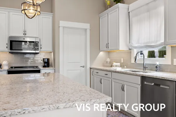 $524,900 | 16501 Wickshire Pl Spring Lake, Spring Lake, MI 49456