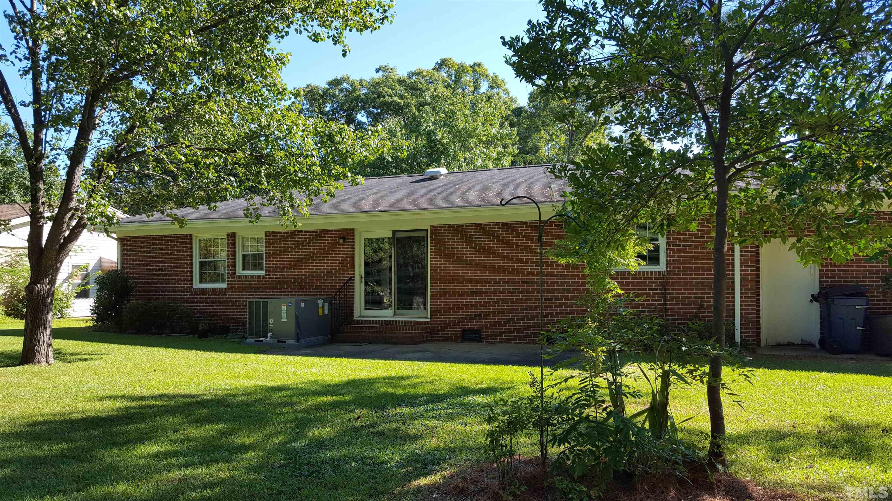212 Longview Drive Smithfield, NC 27577 - Photo 12 of 15 a view of a house with a yard