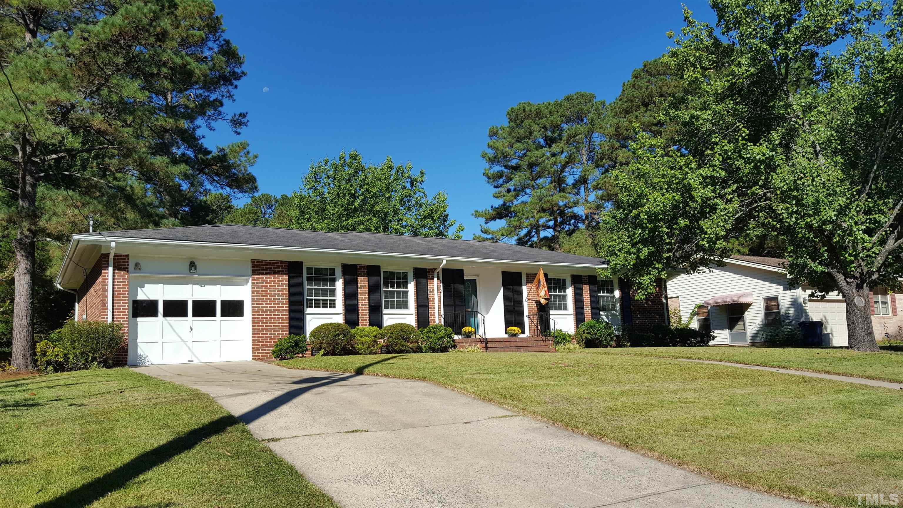 212 Longview Drive Smithfield, NC 27577 - Photo 3 of 15 front view of a house with a yard