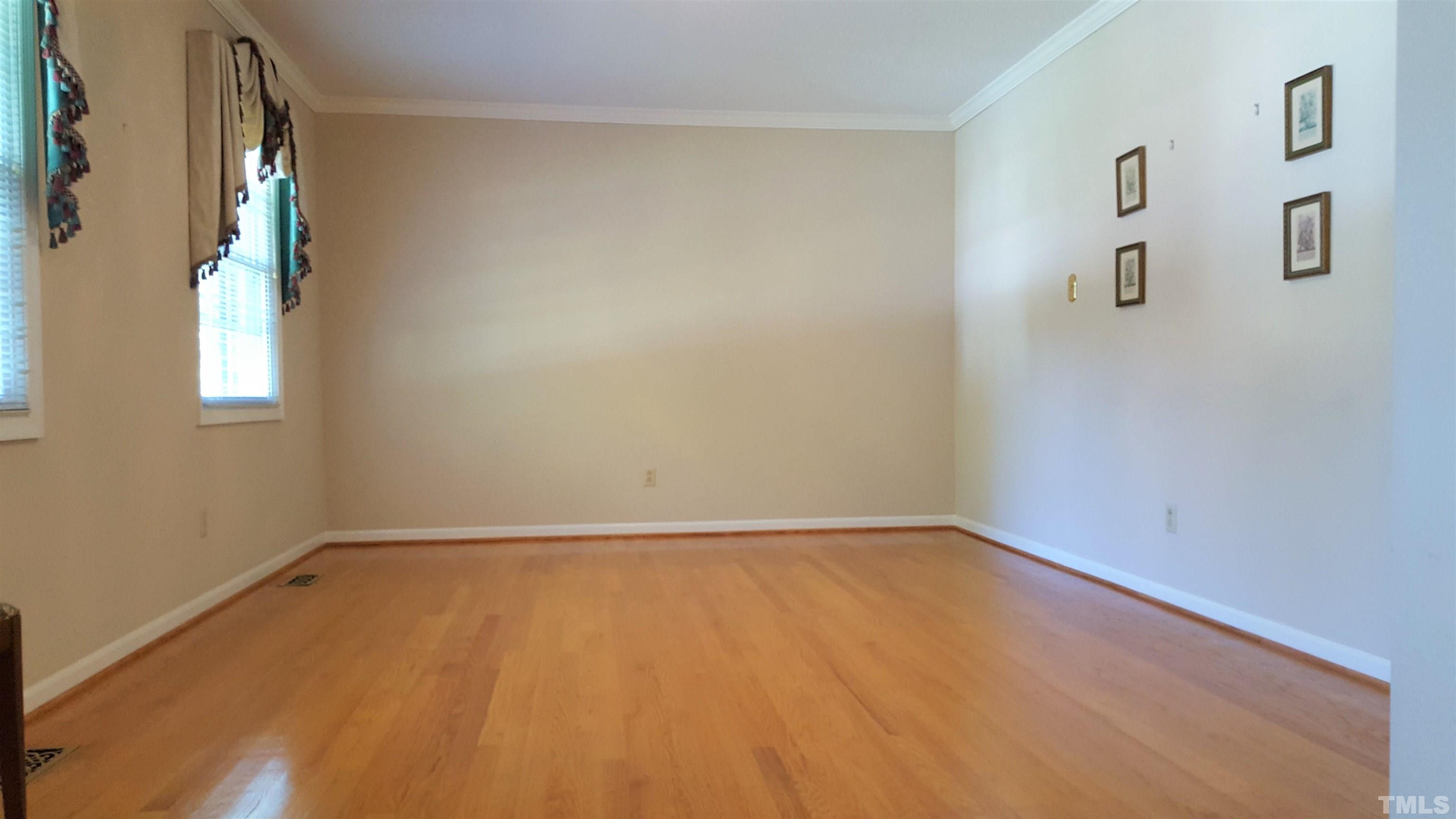 212 Longview Drive Smithfield, NC 27577 - Photo 5 of 15 a view of an empty room with a window