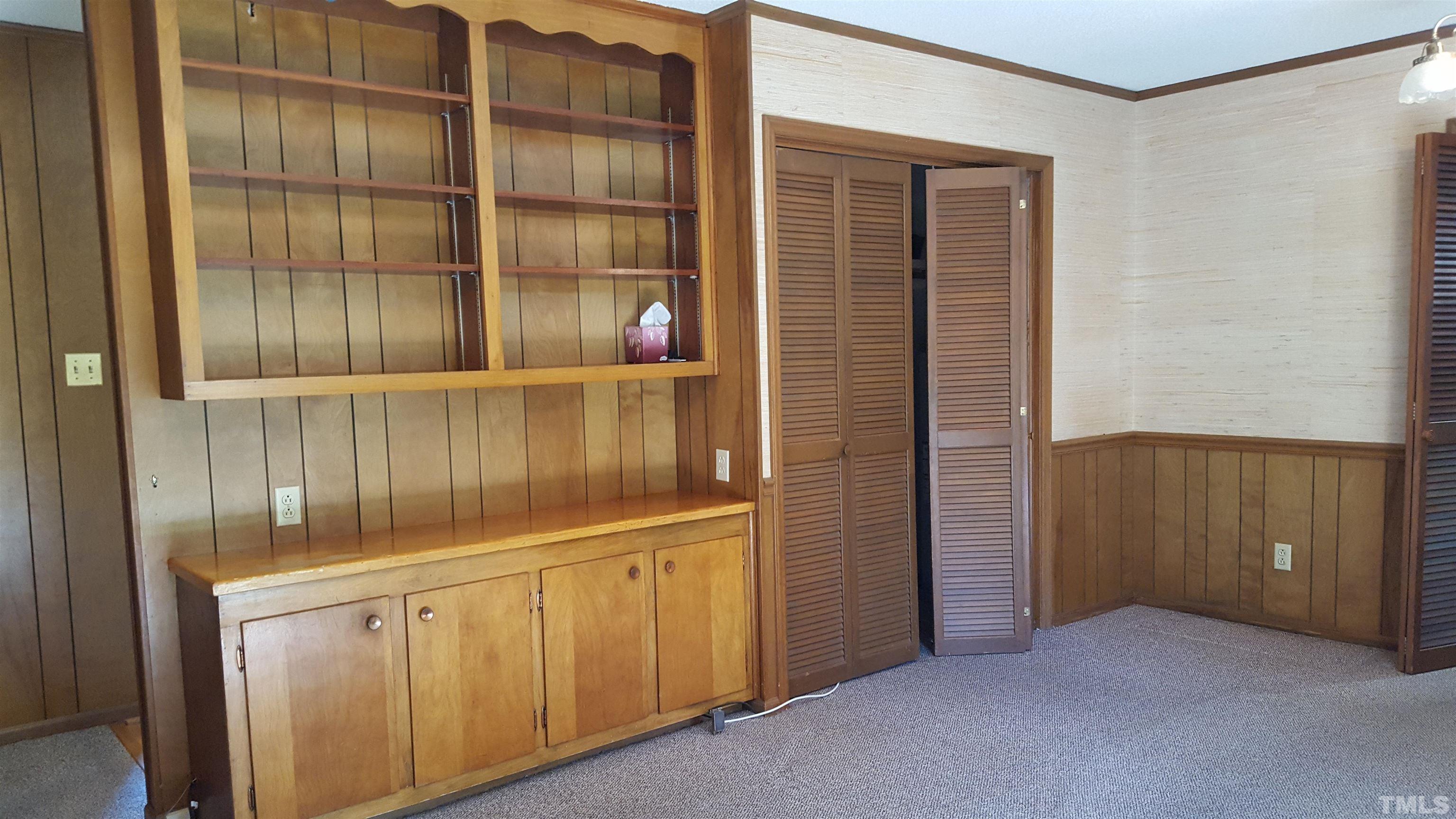 212 Longview Drive Smithfield, NC 27577 - Photo 8 of 15 an empty room with cabinet