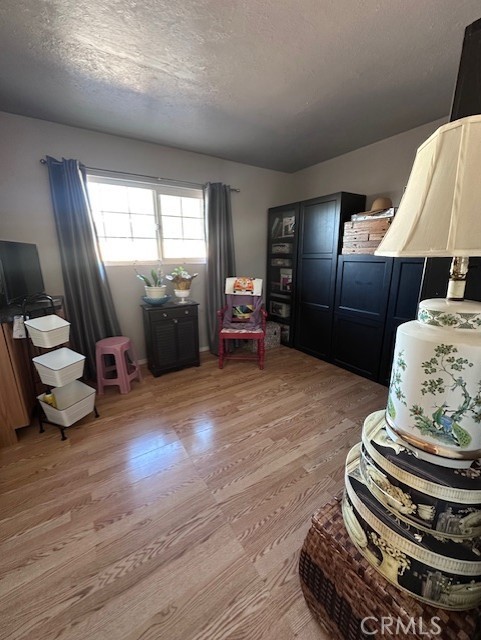 25478 Ash Road Barstow, CA 92311 - Photo 15 of 35 a lobby with furniture and a chandelier