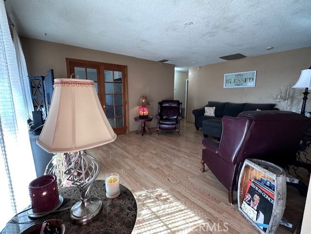 25478 Ash Road Barstow, CA 92311 - Photo 19 of 35 a living room with furniture and a couch