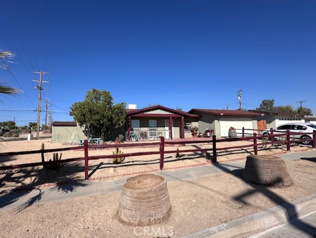 25478 Ash Road Barstow, CA 92311 - Photo 2 of 35 a view of a terrace with chairs
