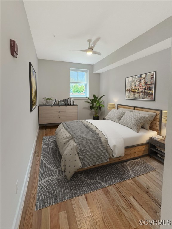 3215 Stuart Avenue, Unit 30 Richmond, VA 23221 - Photo 12 of 28 a bedroom with a large bed and a couch