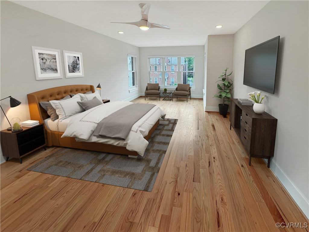 3215 Stuart Avenue, Unit 30 Richmond, VA 23221 - Photo 17 of 28 a spacious bedroom with a bed and a flat screen tv