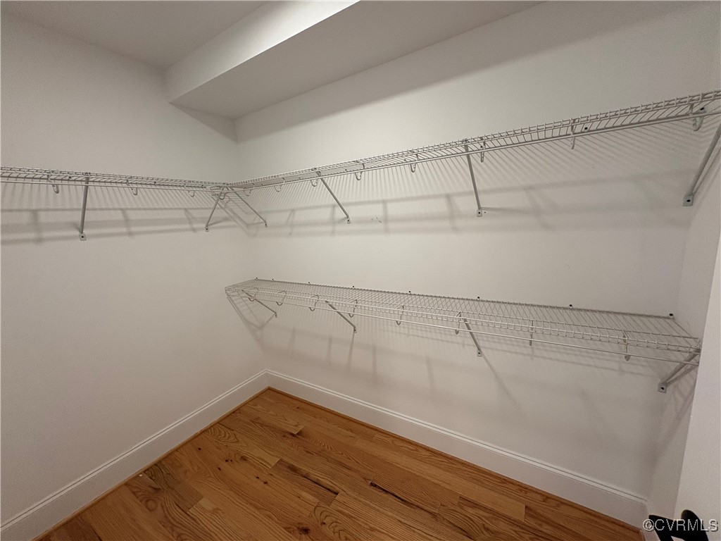 3215 Stuart Avenue, Unit 30 Richmond, VA 23221 - Photo 20 of 28 a view of a room with racks on the wall