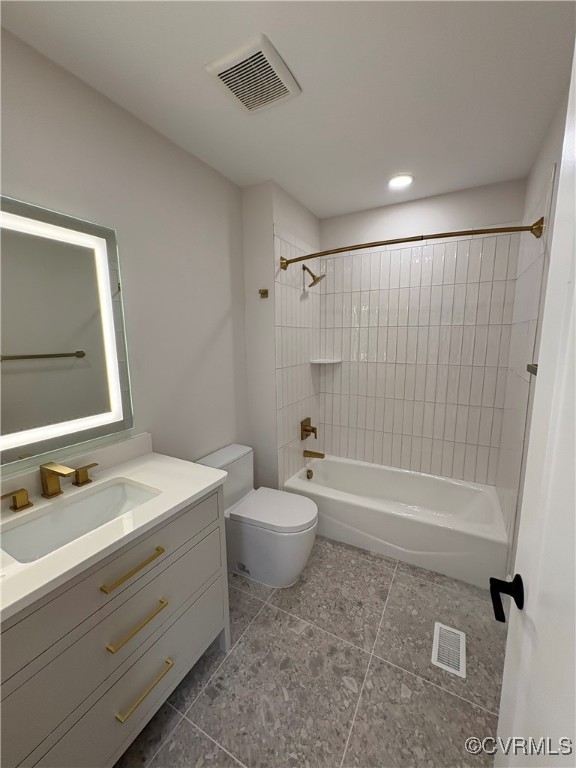 3215 Stuart Avenue, Unit 30 Richmond, VA 23221 - Photo 24 of 28 a bathroom with a double vanity sink toilet mirror and bathtub
