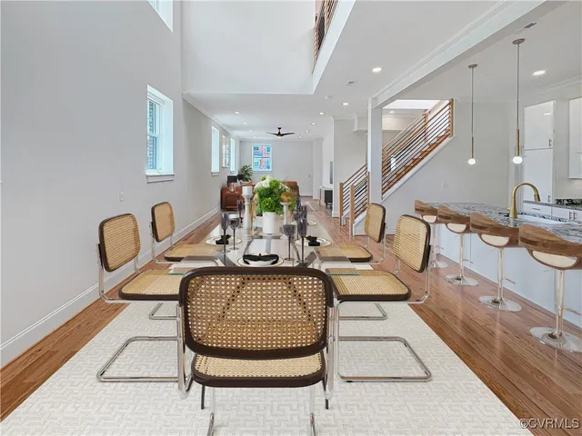 a view of a room with wooden floor and window