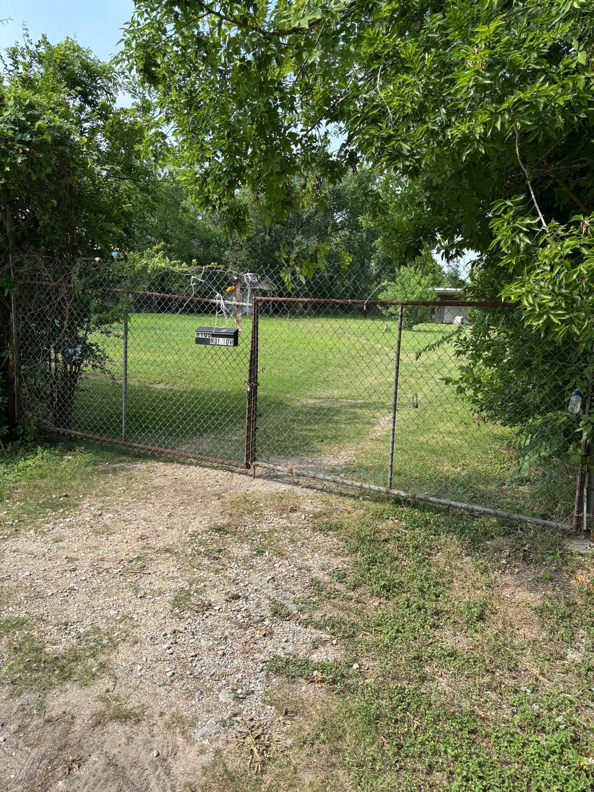 6105 Morrow Street Houston, TX 77091 - Photo 2 of 3 a view of a yard with a tree