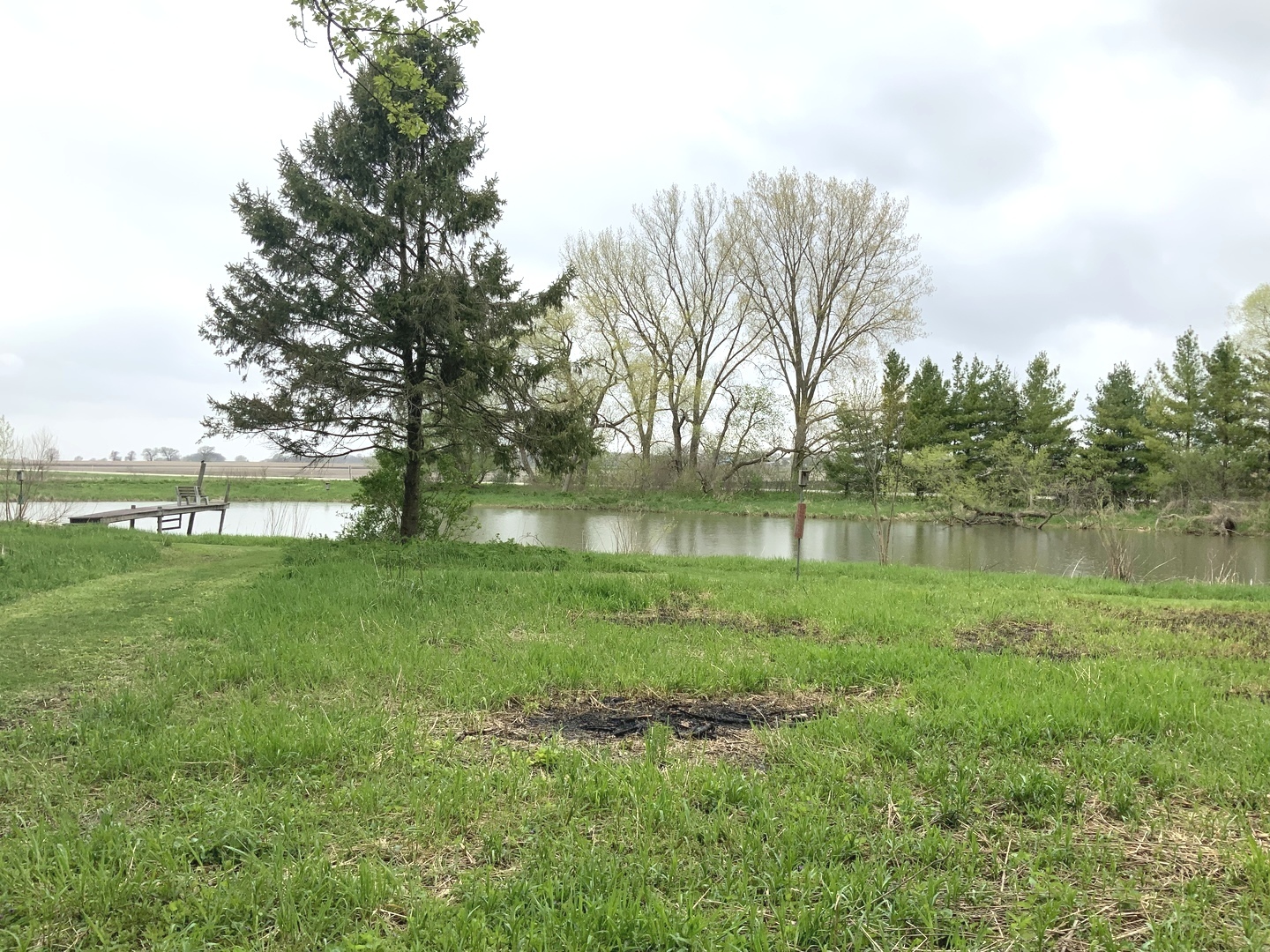 48W849 Middleton Road Maple Park, IL 60151 - Photo 40 of 46 a backyard of a house with lots of green space and lake view