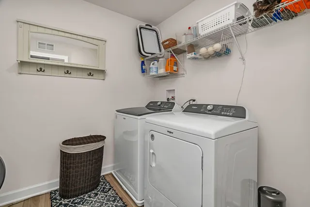 a utility room with cabinets