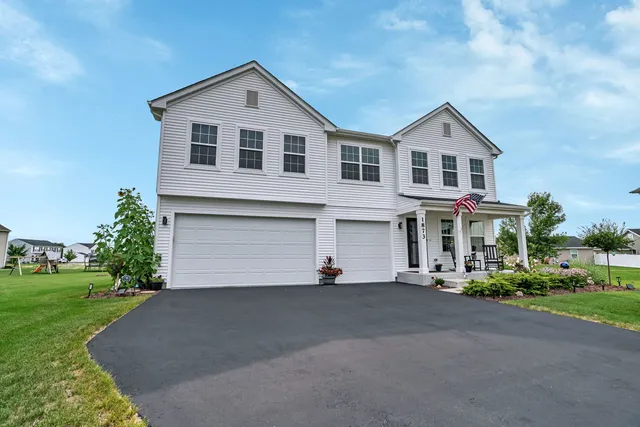 a view of a house with a street