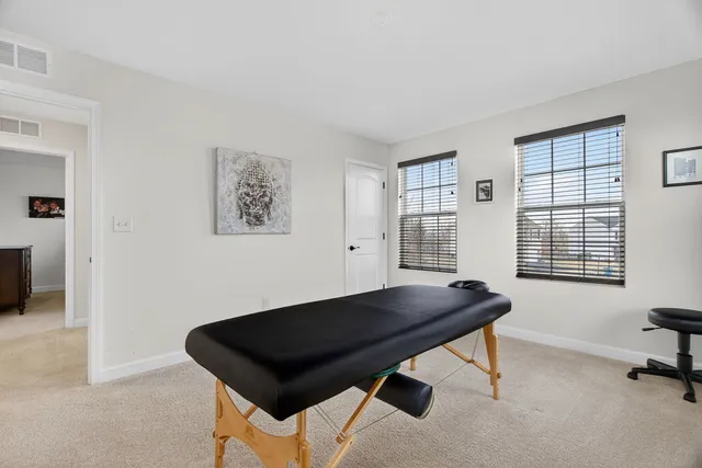 a room with furniture and a window