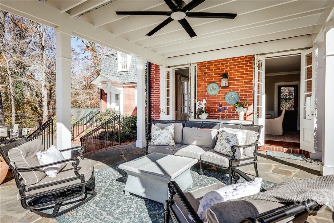 255 Plum Nelly Road Athens, GA 30606 - Photo 16 of 71 Covered, Slate Patio with Doors From Dining Room