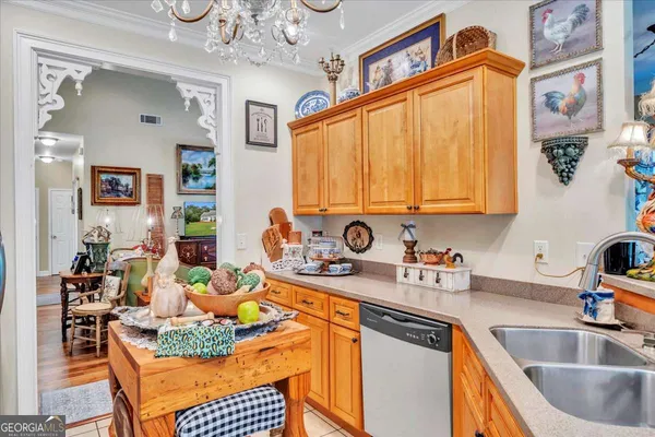 a kitchen with stainless steel appliances granite countertop a stove and a microwave