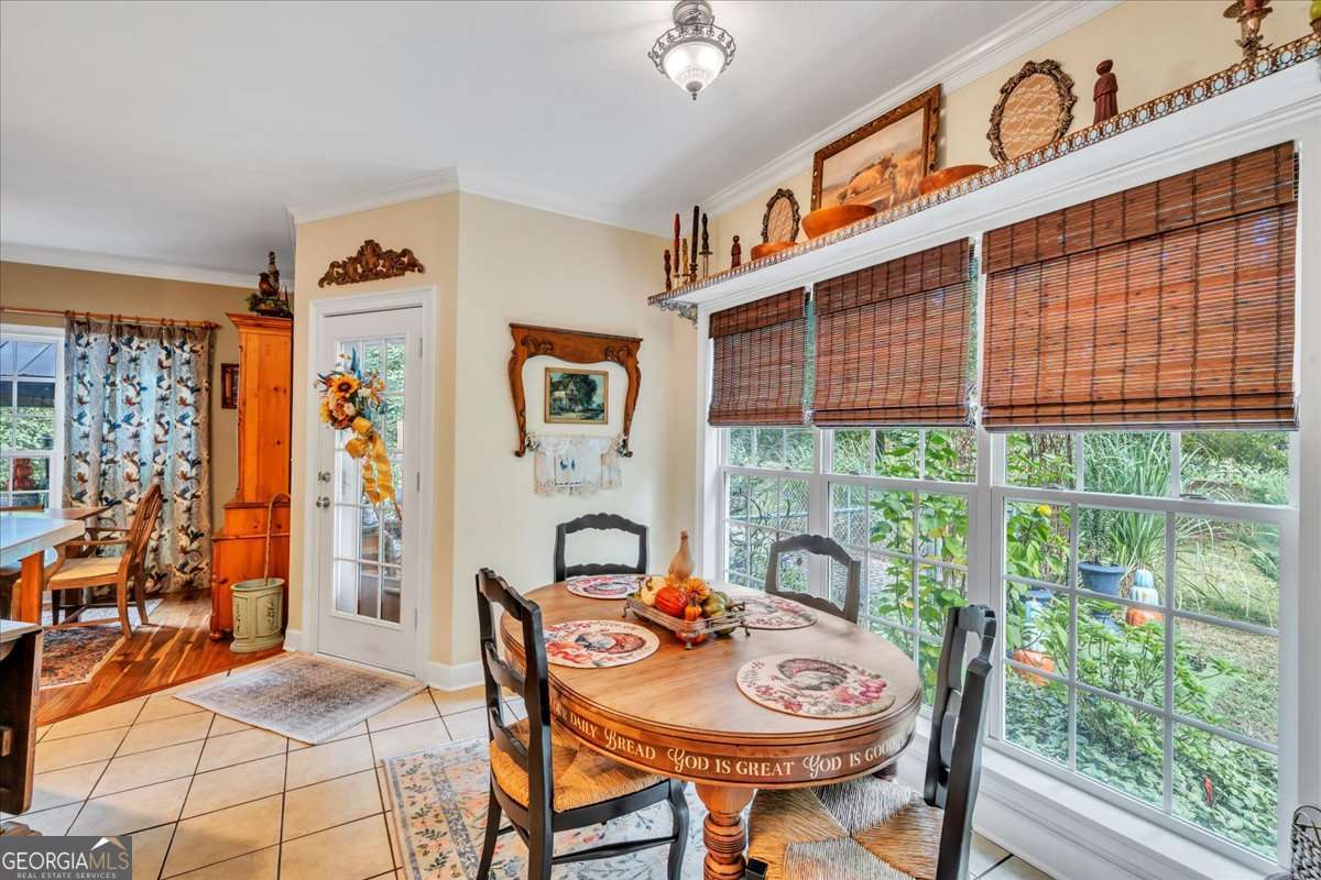 153 Landing Road Cordele, GA 31015 - Photo 15 of 62 a view of a dining room with furniture window and outside view