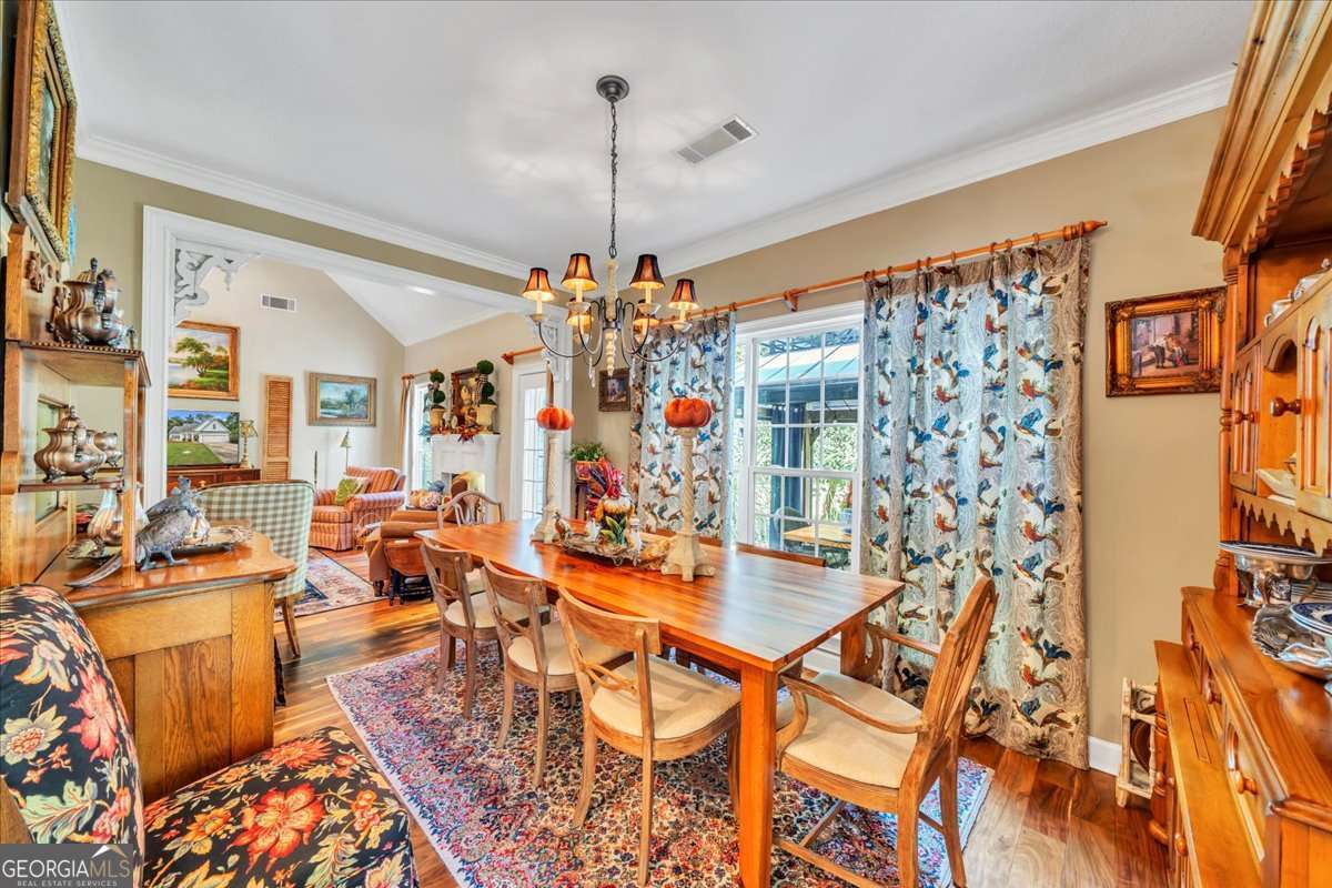 153 Landing Road Cordele, GA 31015 - Photo 16 of 62 a view of a living room and dining room
