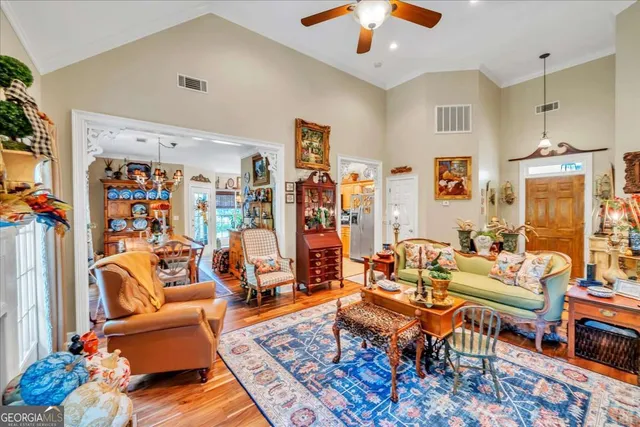 a bed room with furniture and a chandelier