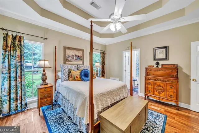 a bedroom with a bed and a closet