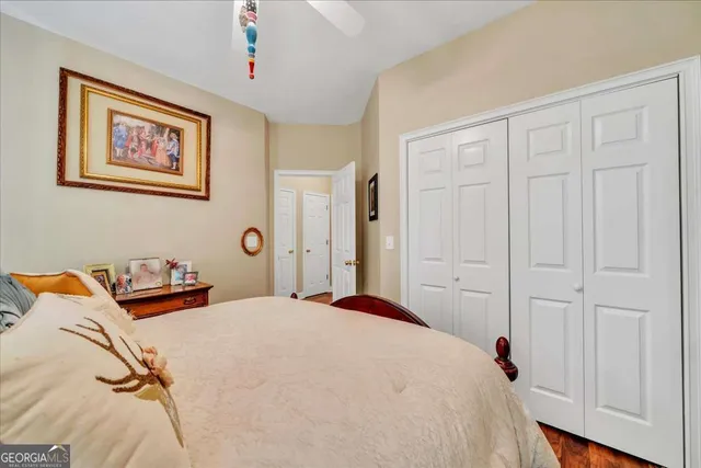 a view of porch with a table and chairs