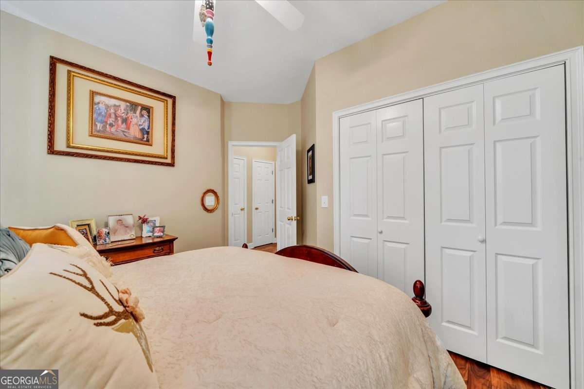 153 Landing Road Cordele, GA 31015 - Photo 28 of 62 a bedroom with a bed and a closet