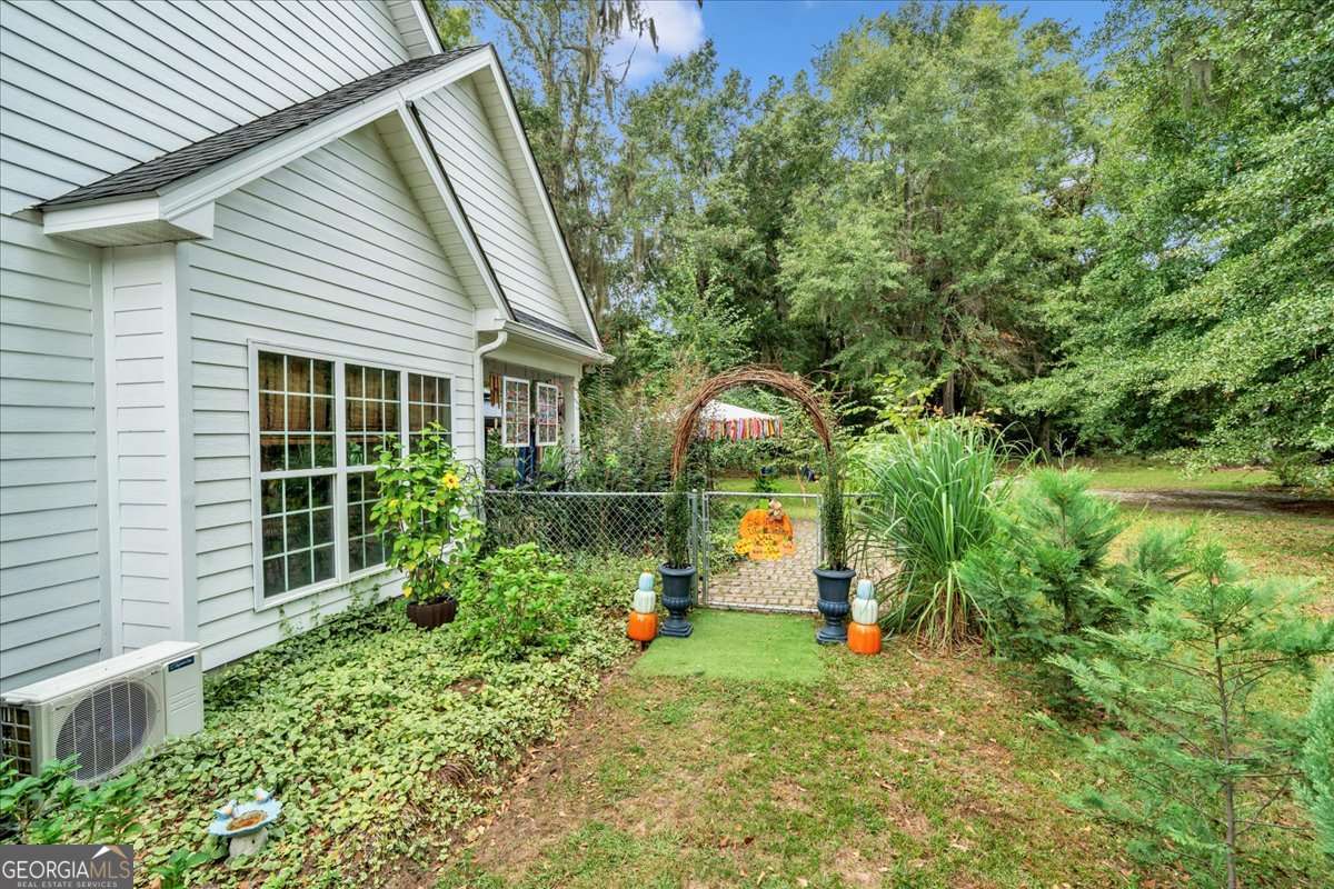 153 Landing Road Cordele, GA 31015 - Photo 46 of 62 a front view of a house with garden