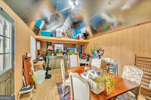 a view of a house with a yard and plants