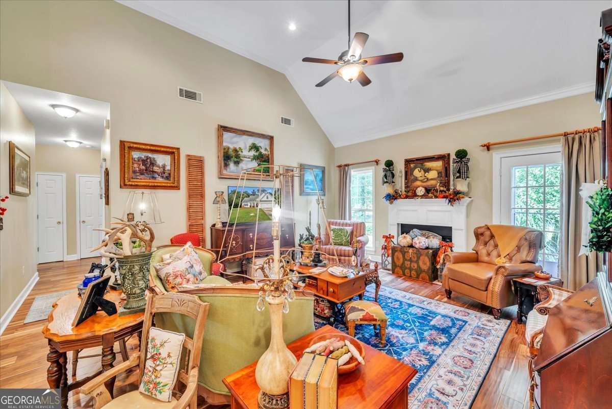 153 Landing Road Cordele, GA 31015 - Photo 5 of 62 a living room with furniture fireplace and a large window