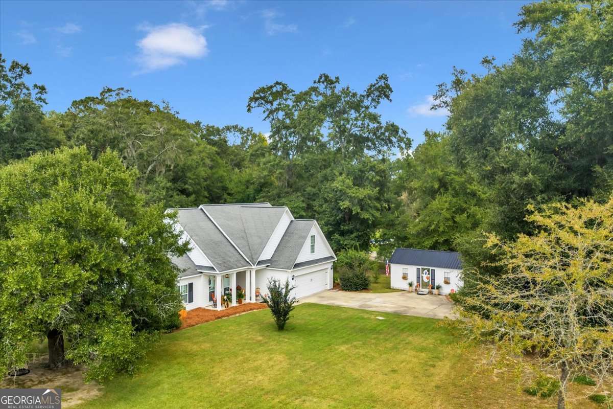 153 Landing Road Cordele, GA 31015 - Photo 52 of 62 an aerial view of a house with a big yard