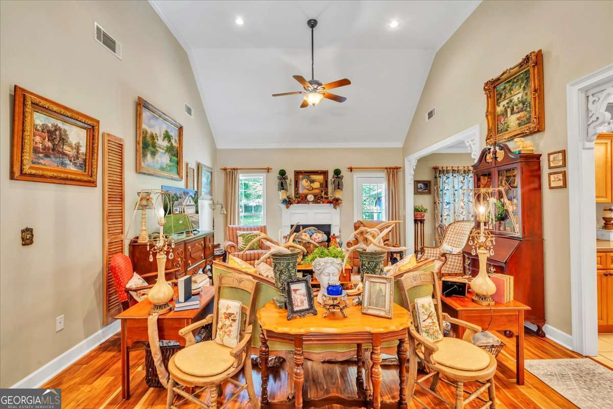153 Landing Road Cordele, GA 31015 - Photo 7 of 62 a dining room with furniture and wooden floor