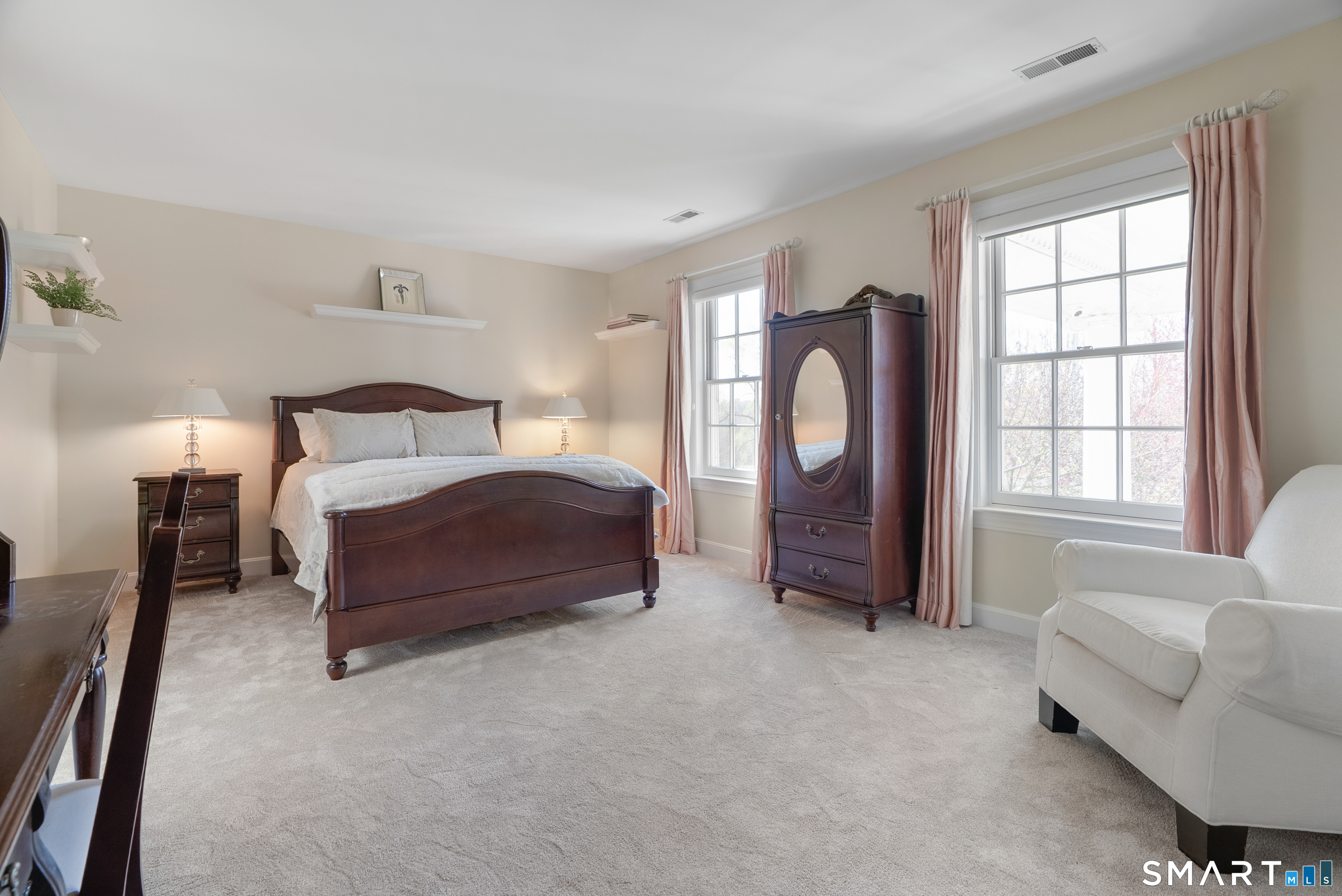 57 Thistledown Suffield, CT 06078 - Photo 22 of 39 a bedroom with a bed couch and a window