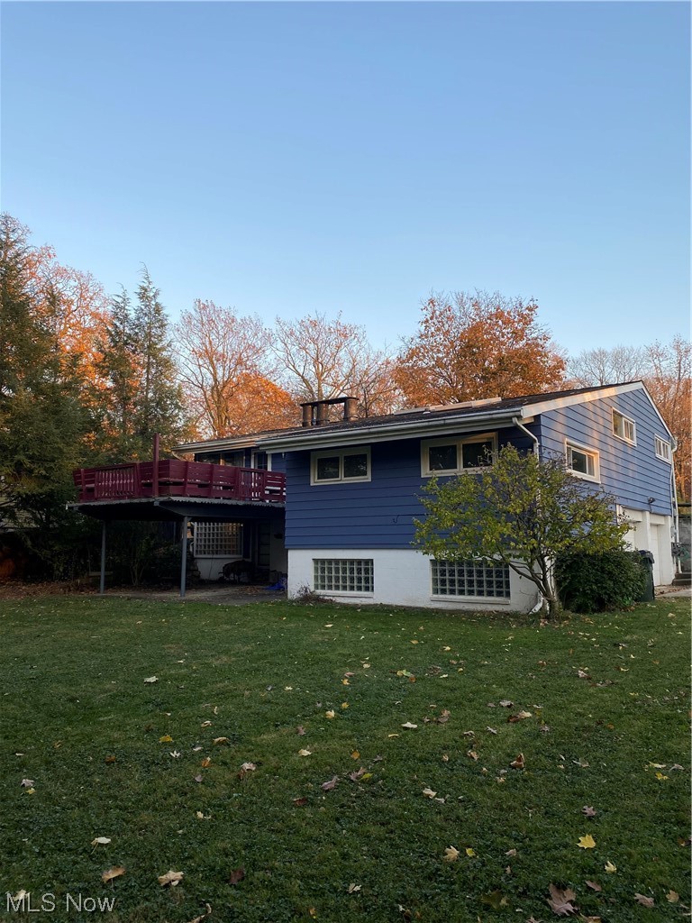 19801 Upper Terrace Road Euclid, OH 44117 - Photo 2 of 22 Back of property featuring a lawn and a deck