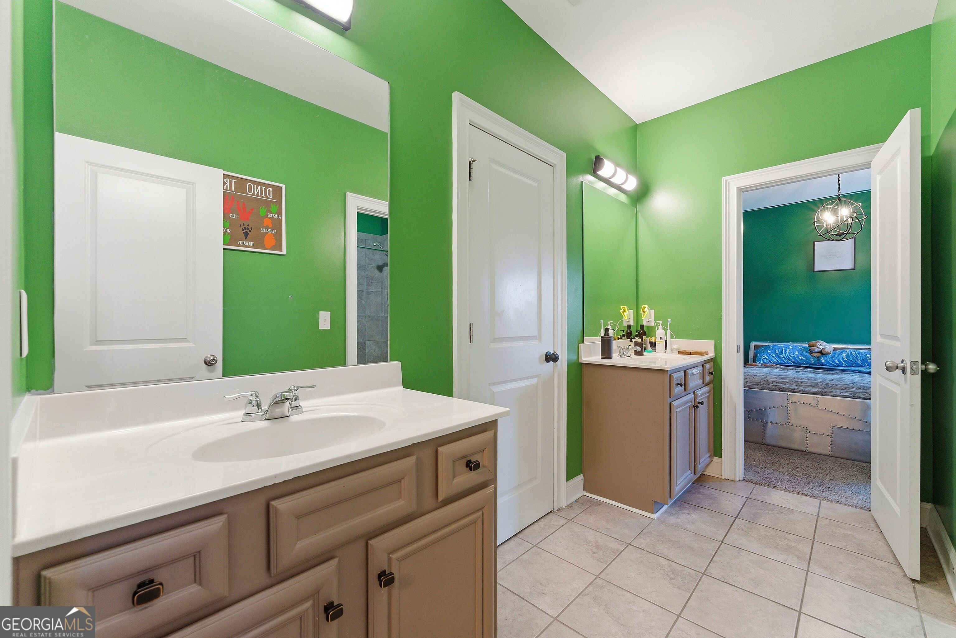 301 Lowell Street Atlanta, GA 30331 - Photo 11 of 28 a bathroom with a sink and a mirror