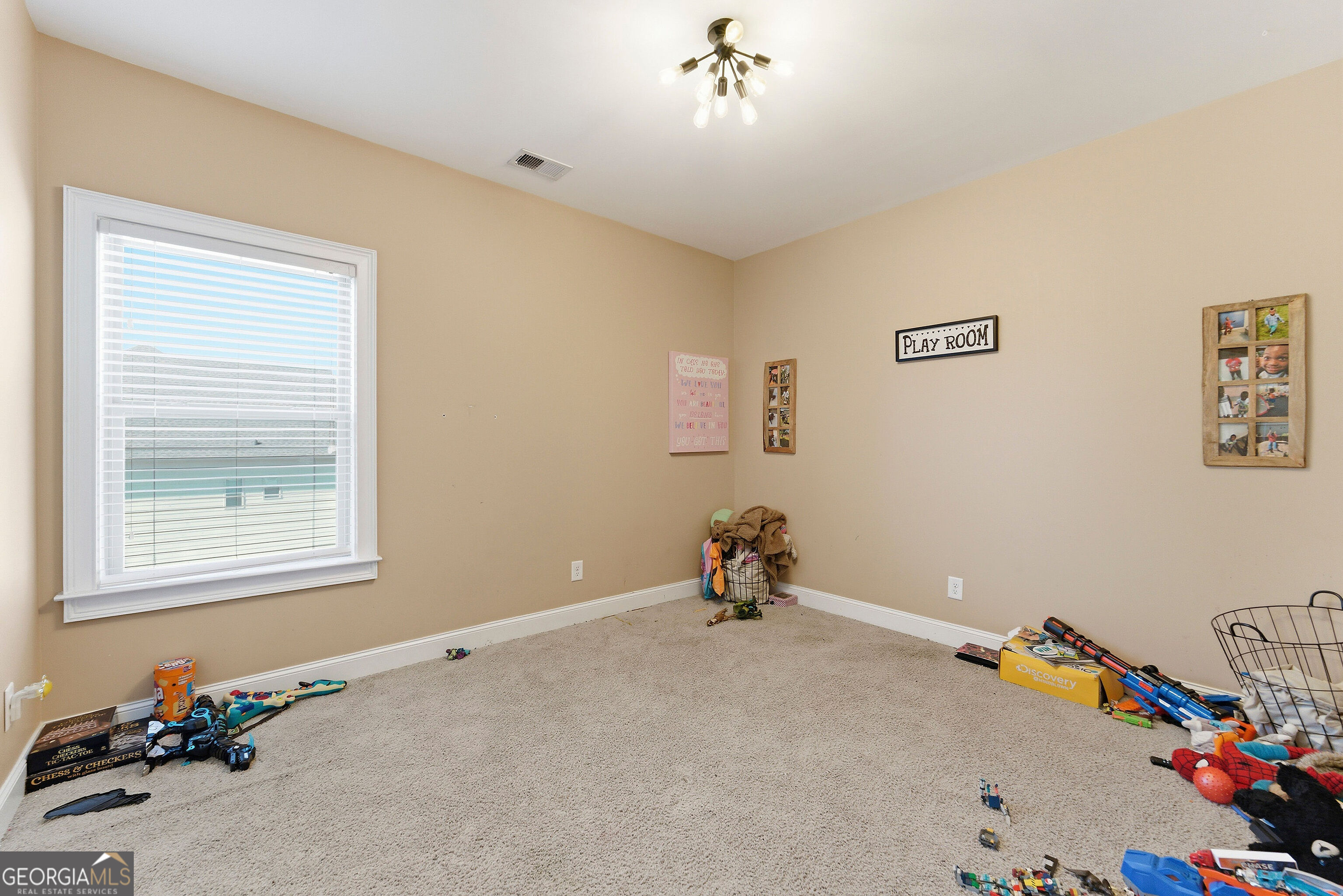 301 Lowell Street Atlanta, GA 30331 - Photo 12 of 28 a view of a room with gym equipment