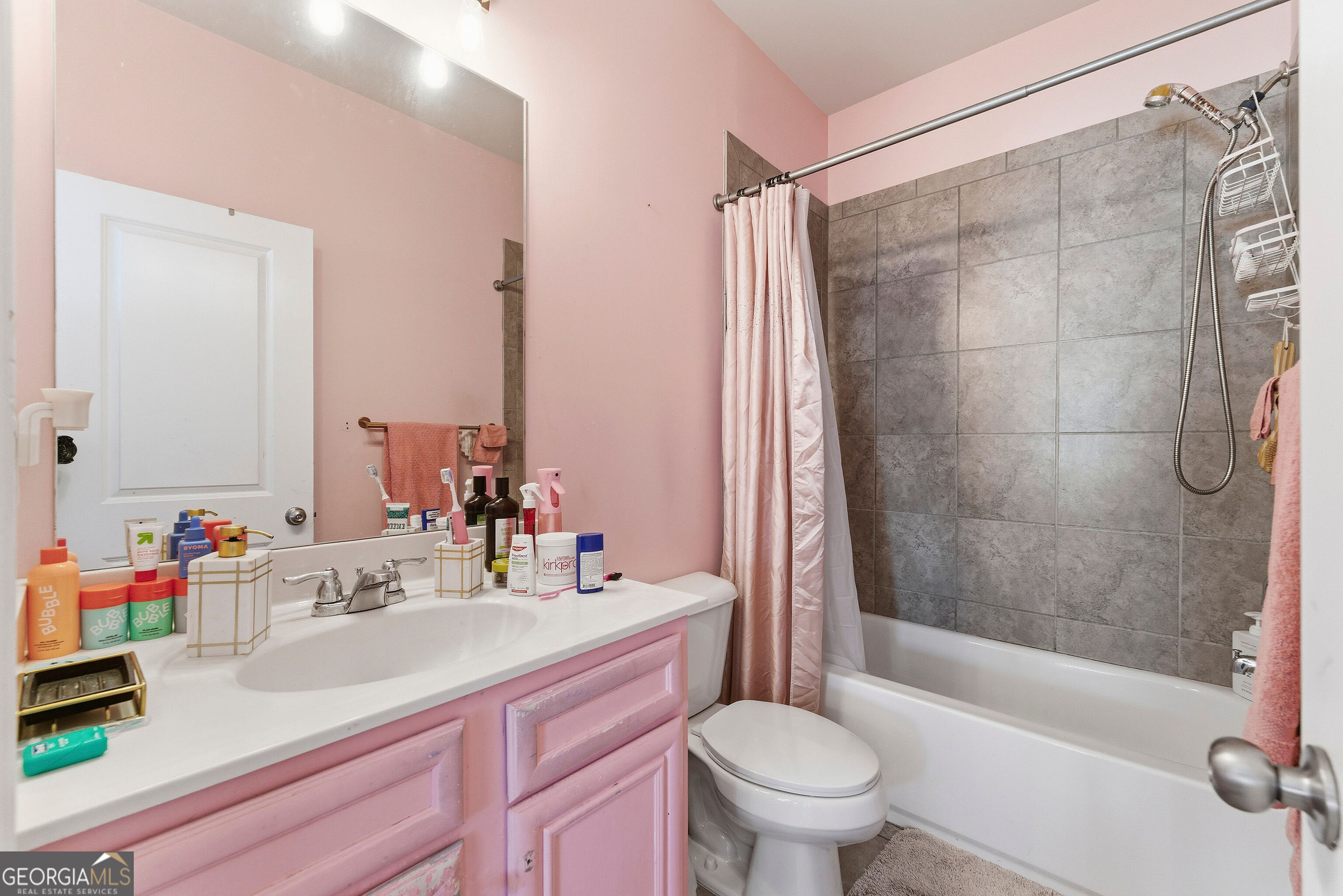 301 Lowell Street Atlanta, GA 30331 - Photo 15 of 28 a bathroom with a sink mirror toilet and bathtub