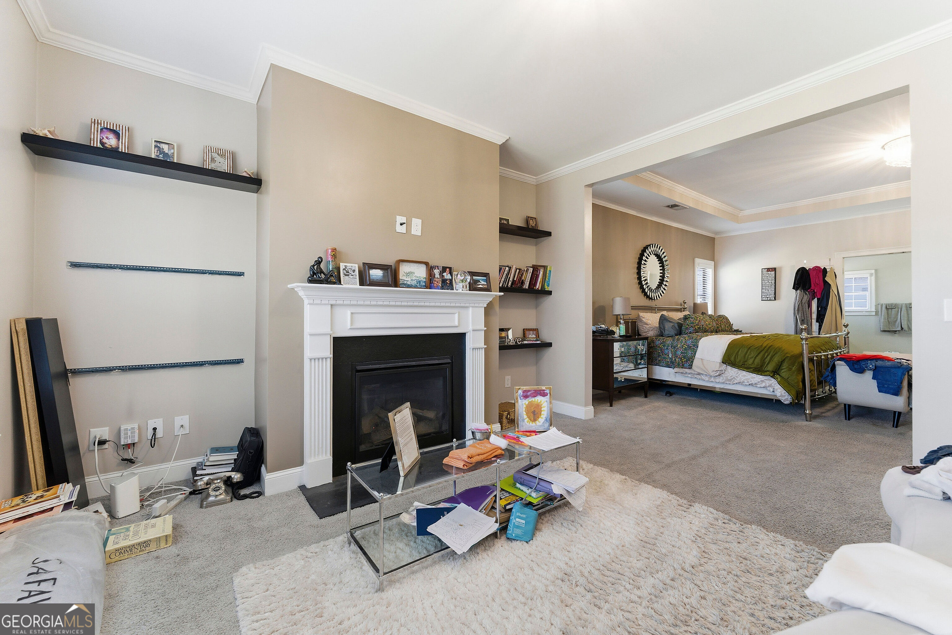 301 Lowell Street Atlanta, GA 30331 - Photo 17 of 28 a living room with furniture and a fireplace